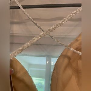 Size 18 “Blush” brand dress. New with tags. Bought from bridal salon as sample